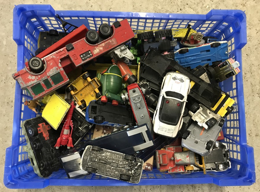 A blue tray of mixed play worn diecast.