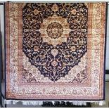 A large Keshan Carpet with blue coloured background design.