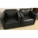 2 black leather tub chairs.