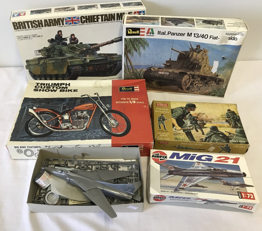 4 boxed part made plastic kits together with a boxed Airfix 1:32 scale German Infantry.