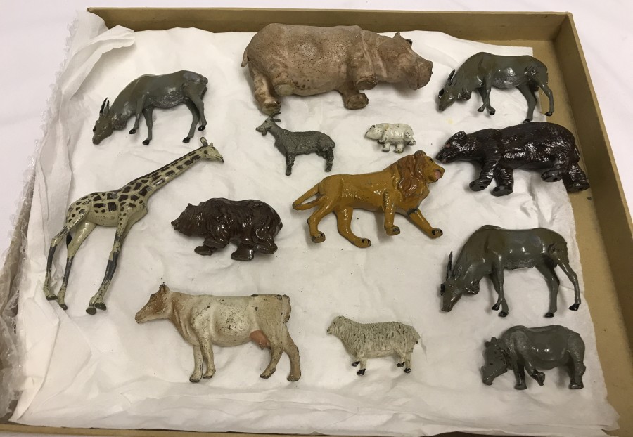 A collection of 13 lead zoo and farm animals, mostly Britains.