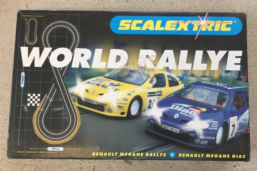 A boxed Scalextric World Rally, with Renault Megane cars.