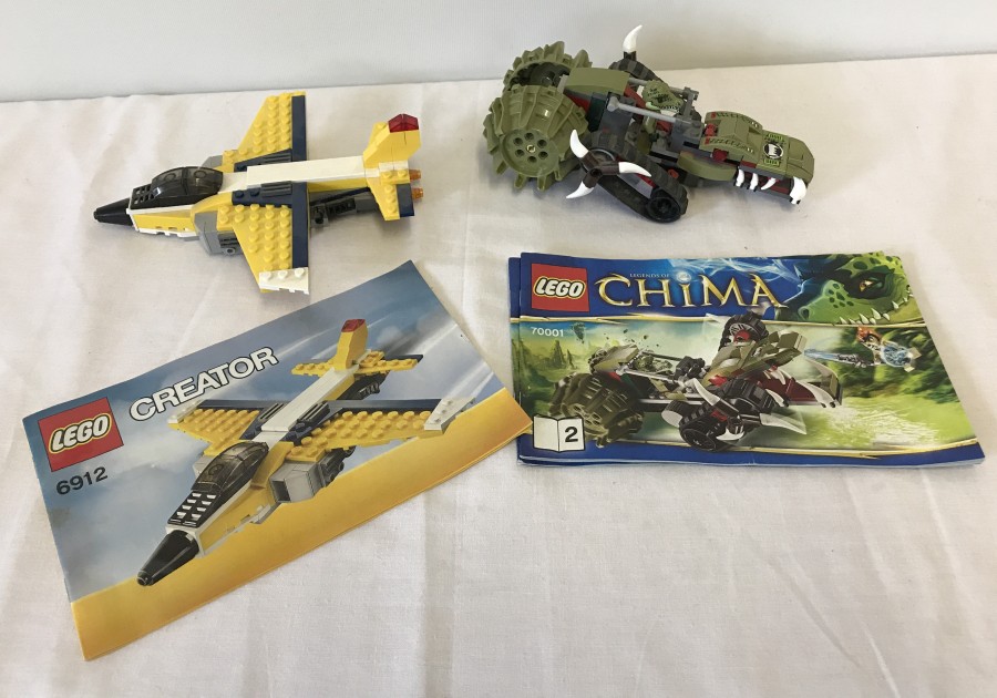 2 Lego models with original instruction booklets.