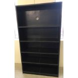 A brown havanah leather 4 shelf designer bookcase by Mufti