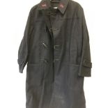 A Woollen Post Office duffle coat.