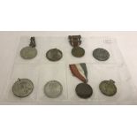 A collection of 8 George V coronation medals.