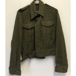 A Canadian WWII battledress jacket with RCA shoulder flash.