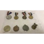 A collection of 8 George VI coronation medals.
