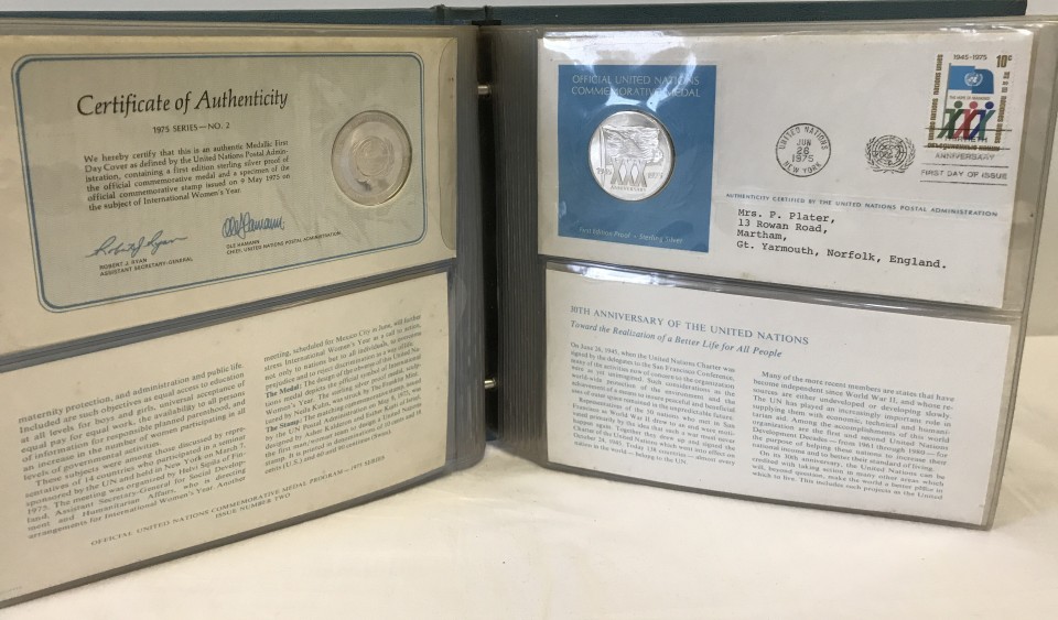 Folder of 4 United Nations silver proof medallic first day cover sets.