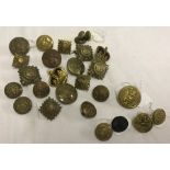 A quantity of assorted British military buttons, officer's pips & crowns.