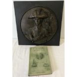 A modern Admiral Nelson wall plaque with a 1905 Nelson memorial book.