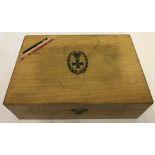 A light wood box with Iron Cross transfer motif to top.
