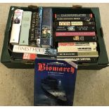 A box of assorted military related hardback books.