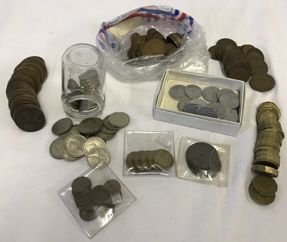 A small collection of mixed British and World vintage coins.