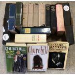 A box of assorted books by and about Churchill.