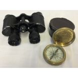 A pair of Military Observer binoculars together with a brass leather cased compass.