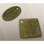 2 WW1 Munitions brass tallies.