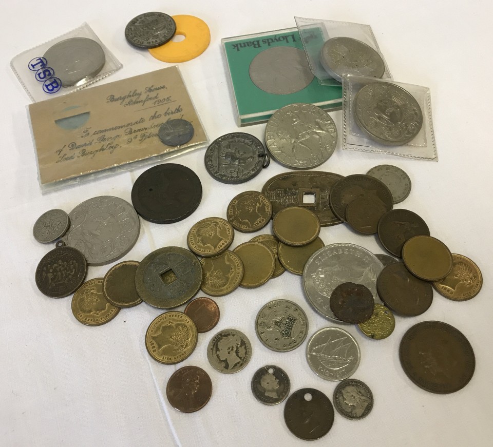 A small quantity of coins, medals and tokens.
