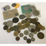 A small quantity of coins, medals and tokens.