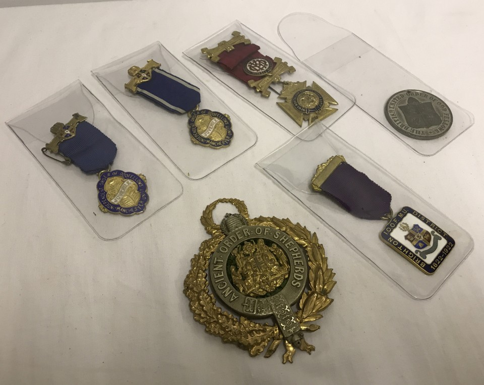 A collection of masonic jewels and badges.