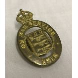 A WW1 1915 Munition Workers lapel badge.