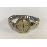 A vintage 9ct gold cased ladies Avia wristwatch with expandable strap.