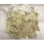 A box of vintage linen & lace to include Maltese brought back during WW1 and christening gowns.