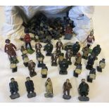 A collection of lead soldiers and O gauge railway figures to include Britains.