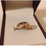 Hallmarked 9ct gold band ring set with 2 diamonds and 2 rubies.