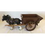 A Melbaware ceramic shire horse with a wooden hay cart.