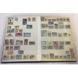 A Postzegels stamp album and contents.