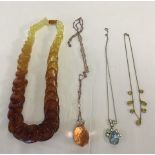 4 costume jewellery necklaces.