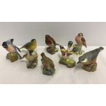 8 porcelain bird figurines to include Beswick, Royal Worcester & Crown Staffordshire.