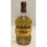 A bottle of Isle of Jura single malt scotch whisky.