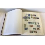 A maroon Viking stamp album full of world stamps, to include stamps from Mexico.