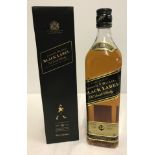 A boxed 70cl bottle of Johnny Walker Black label old Scotch whisky.