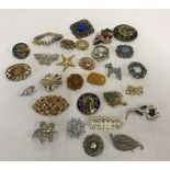 A collection of vintage brooches.