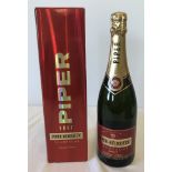 A boxed 75cl bottle of Piper-Heidsieck Brut Champagne.