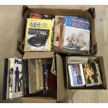 A collection of vintage books, postcards and ephemera.