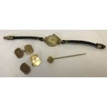 A Victorian gold stick pin, a ladies vintage 9ct gold cased watch, and 9ct gold cufflinks (a/f).