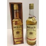 A boxed 75cl bottle of Extra Special Bell's Scotch whisky.