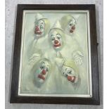 A framed and glazed print of the different faces of a clown.