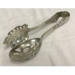 A pair of vintage Sterling silver fruit serving tongs.