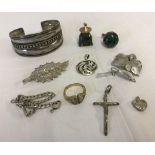 A small collection of silver and white metal jewellery together with a jade Buddha pendant.