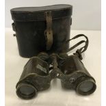 A pair of vintage Ross binoculars.