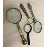 4 magnifying glasses.