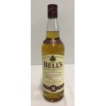 A bottle of Bell's Scotch whisky.