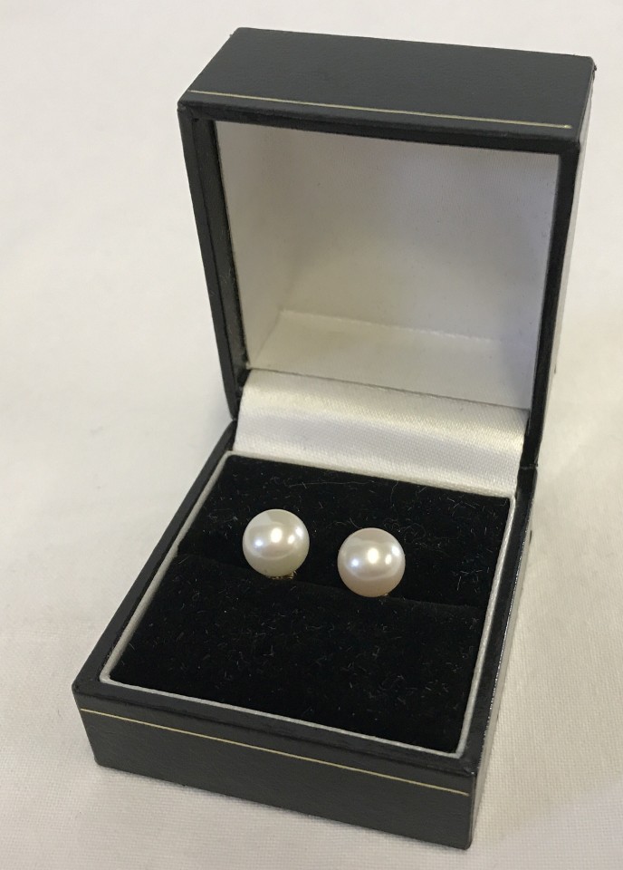 A pair of large real pearl earrings on 14ct posts.