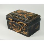 A Japanese Meiji period needlework box, black lacquered and chinoisery decorated, with hinged