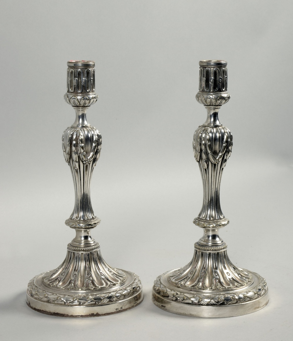 A pair of 19c Christofle baluster candlesticks, 11h.